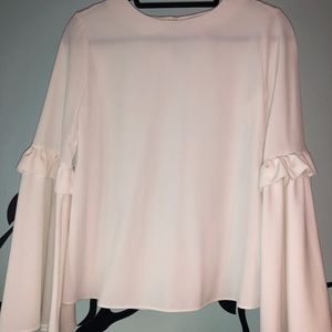 white top with bell sleeves